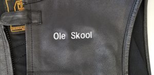 Letter embroidery over leather